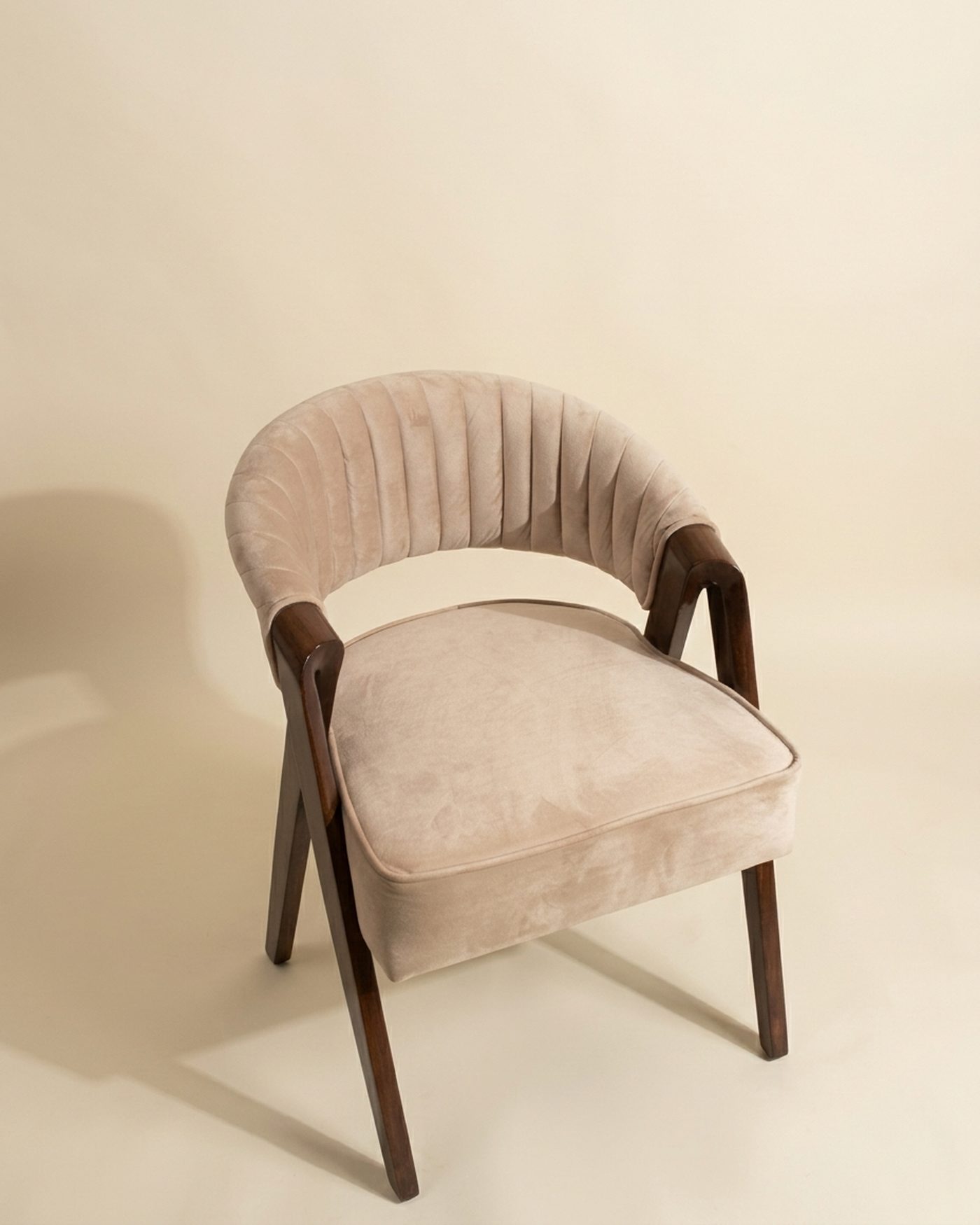 Blush Arc accent chair, studio photo