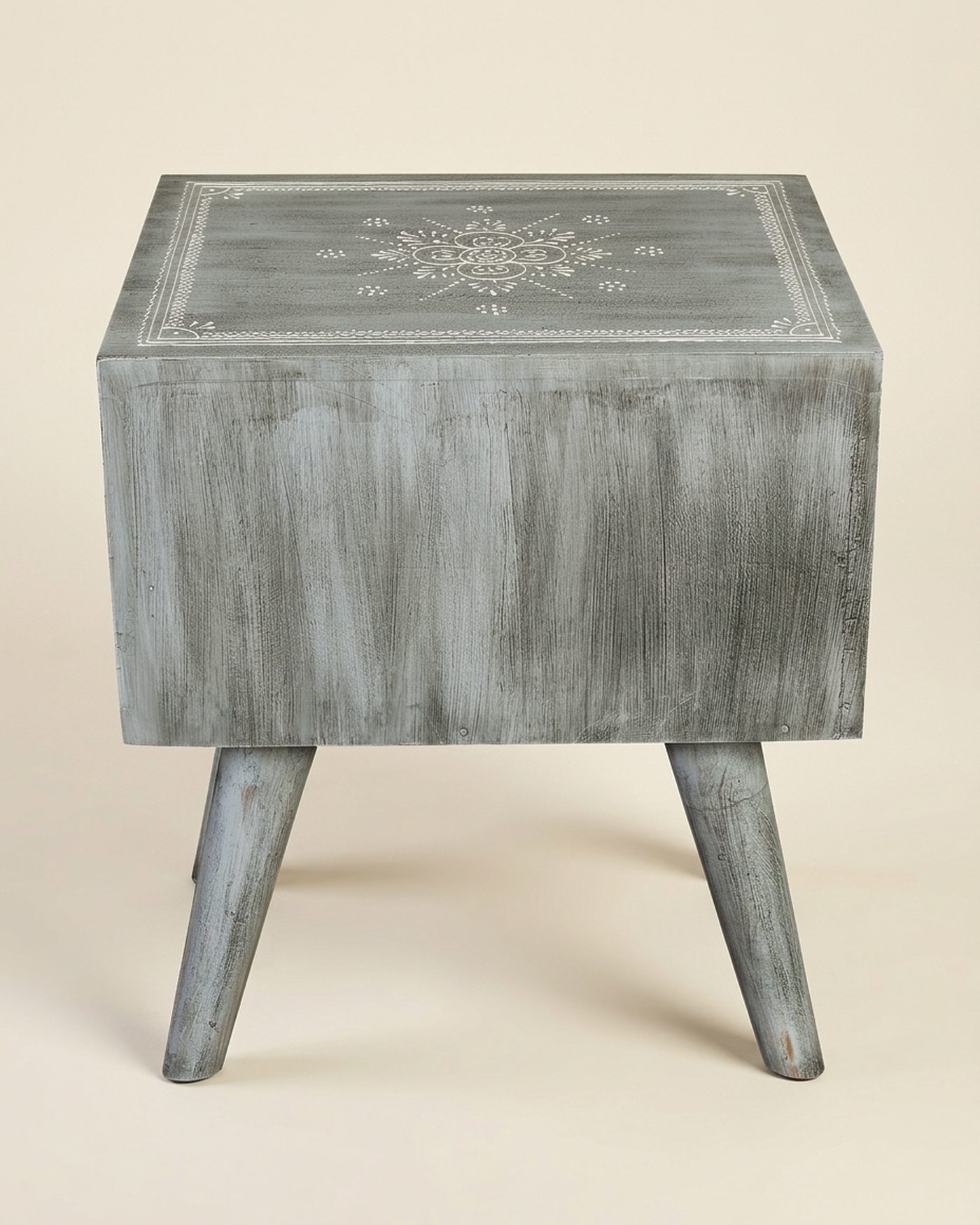 Etched painted side table, studio photo