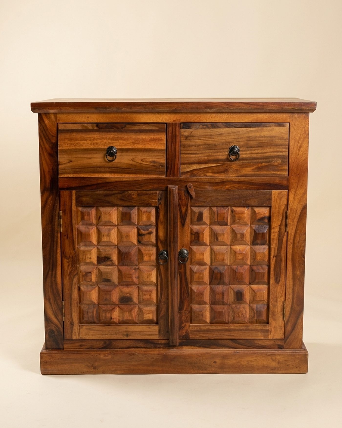 Facet carved sideboard, studio photo