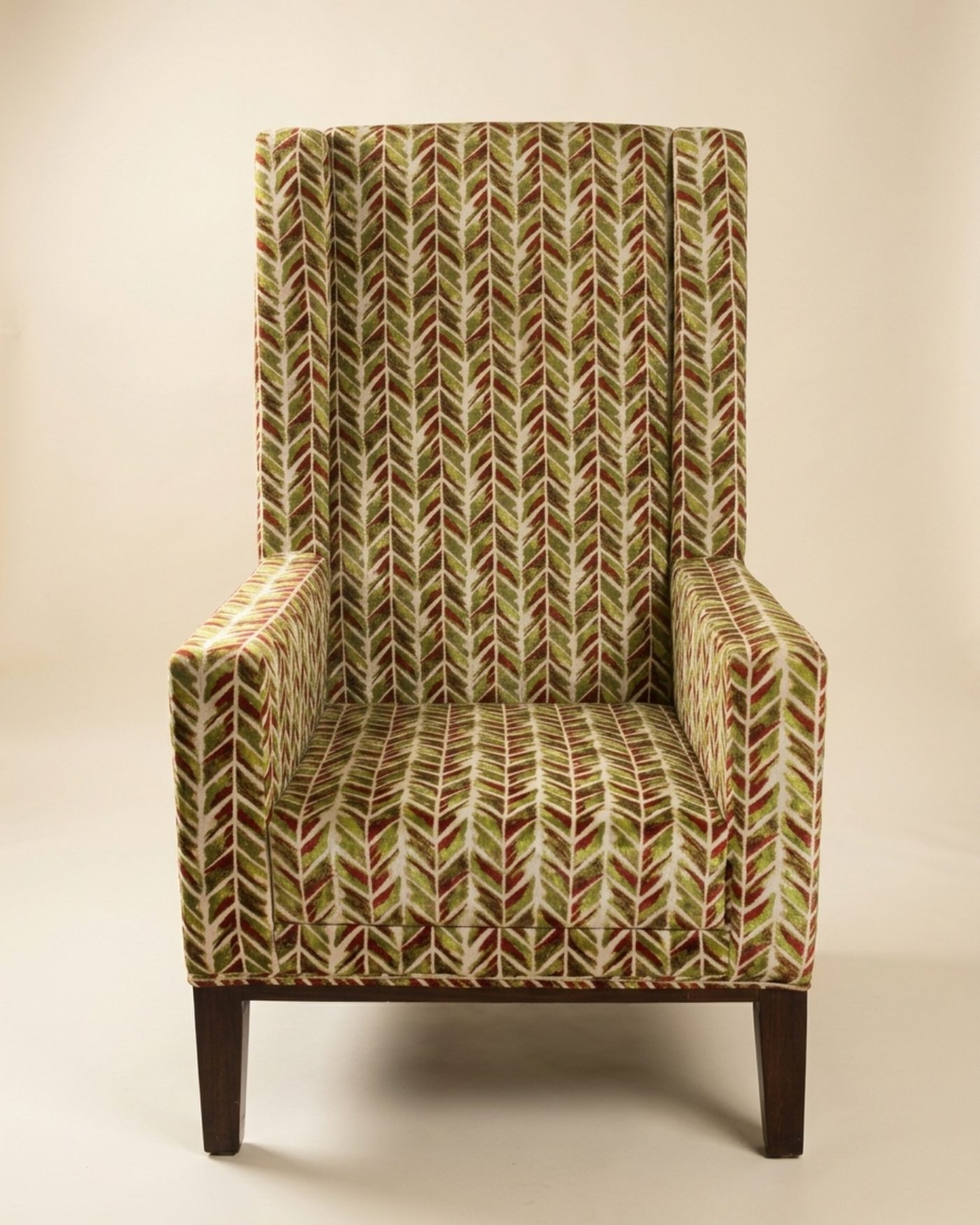 Herringbone wingback chair, studio photo