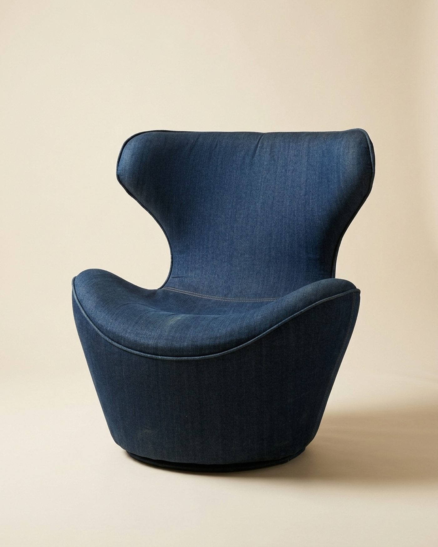 Pod swivel egg chair, studio photo