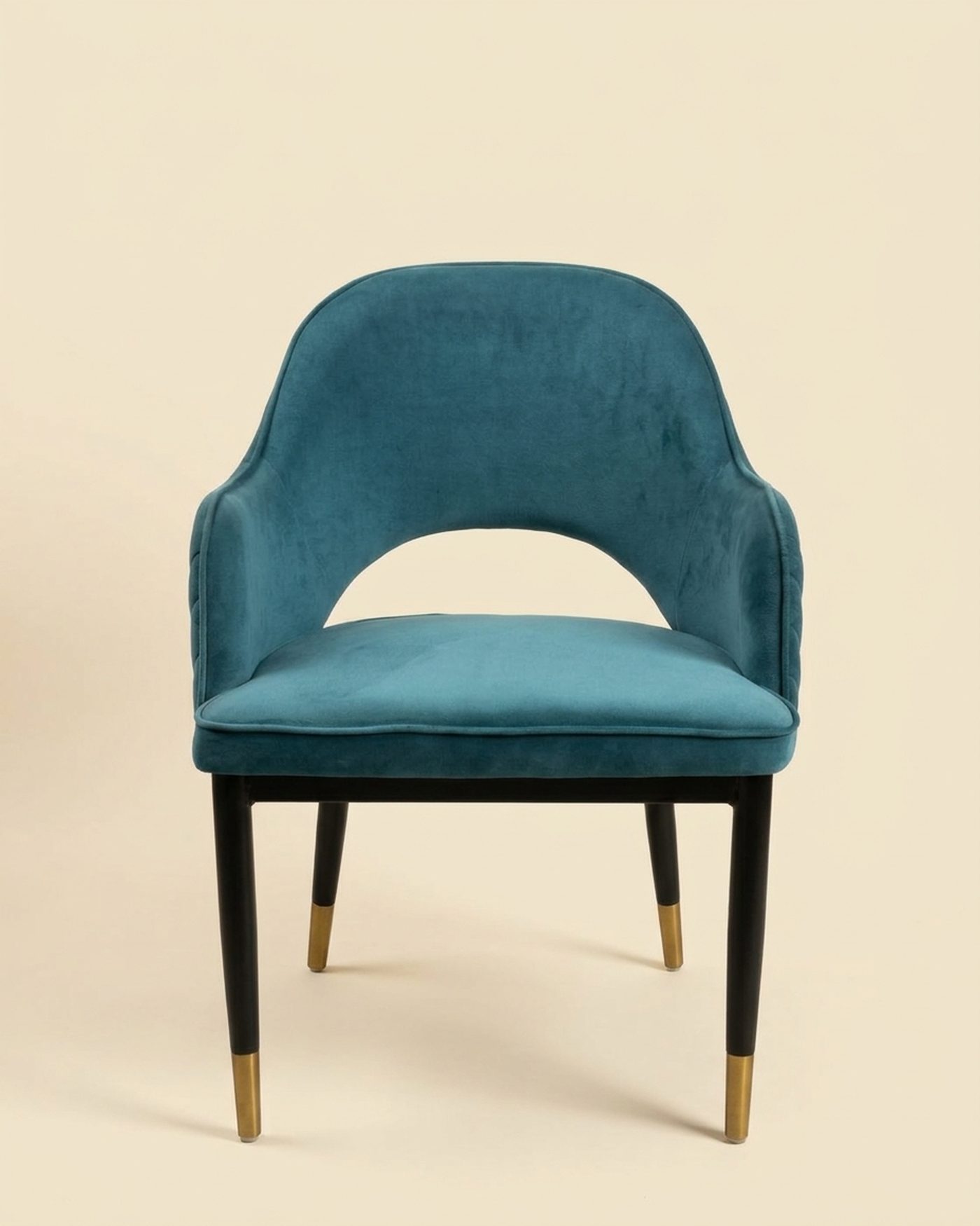 Teal Arc velvet accent chair, studio photo