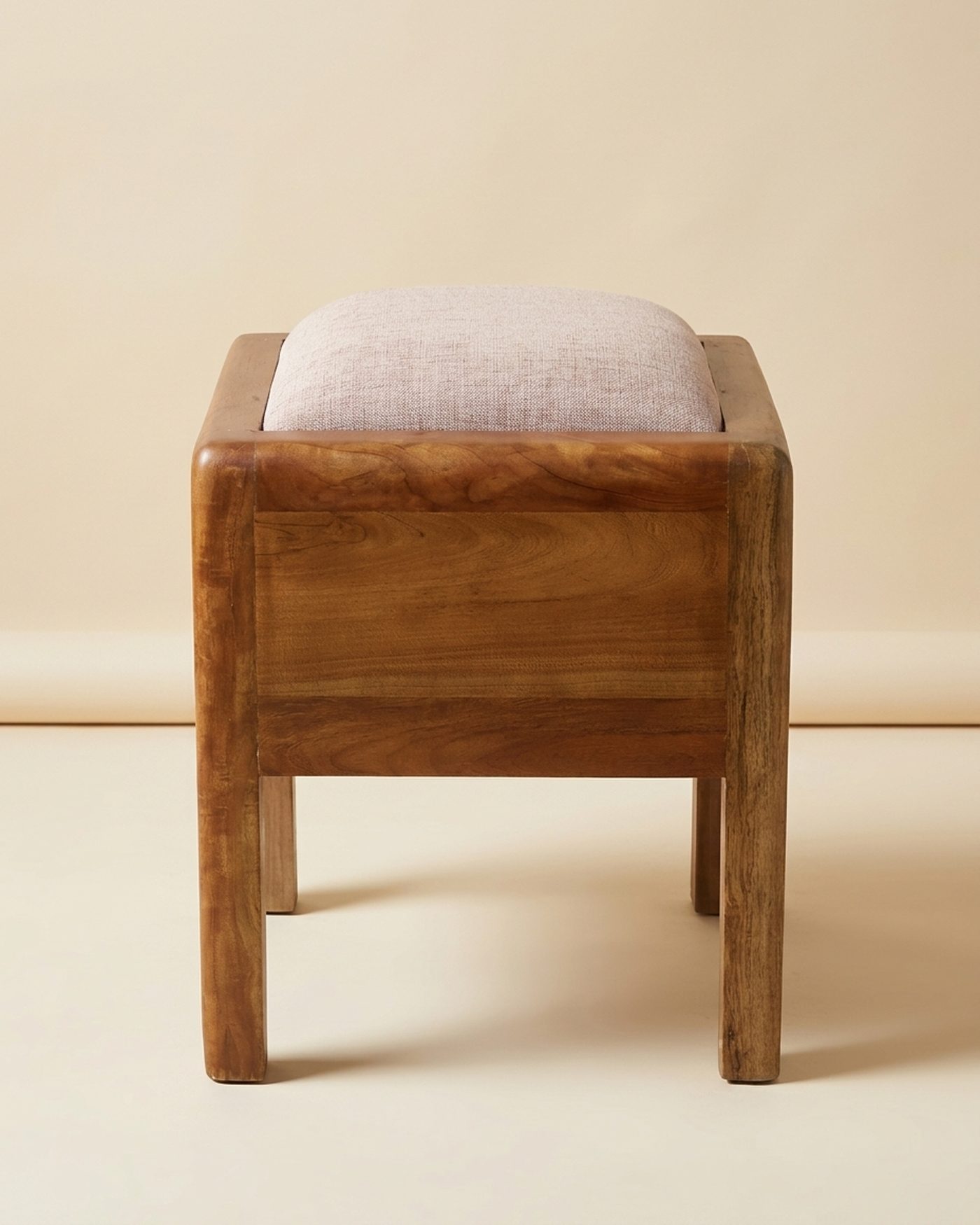 Tuffet upholstered stool, studio photo