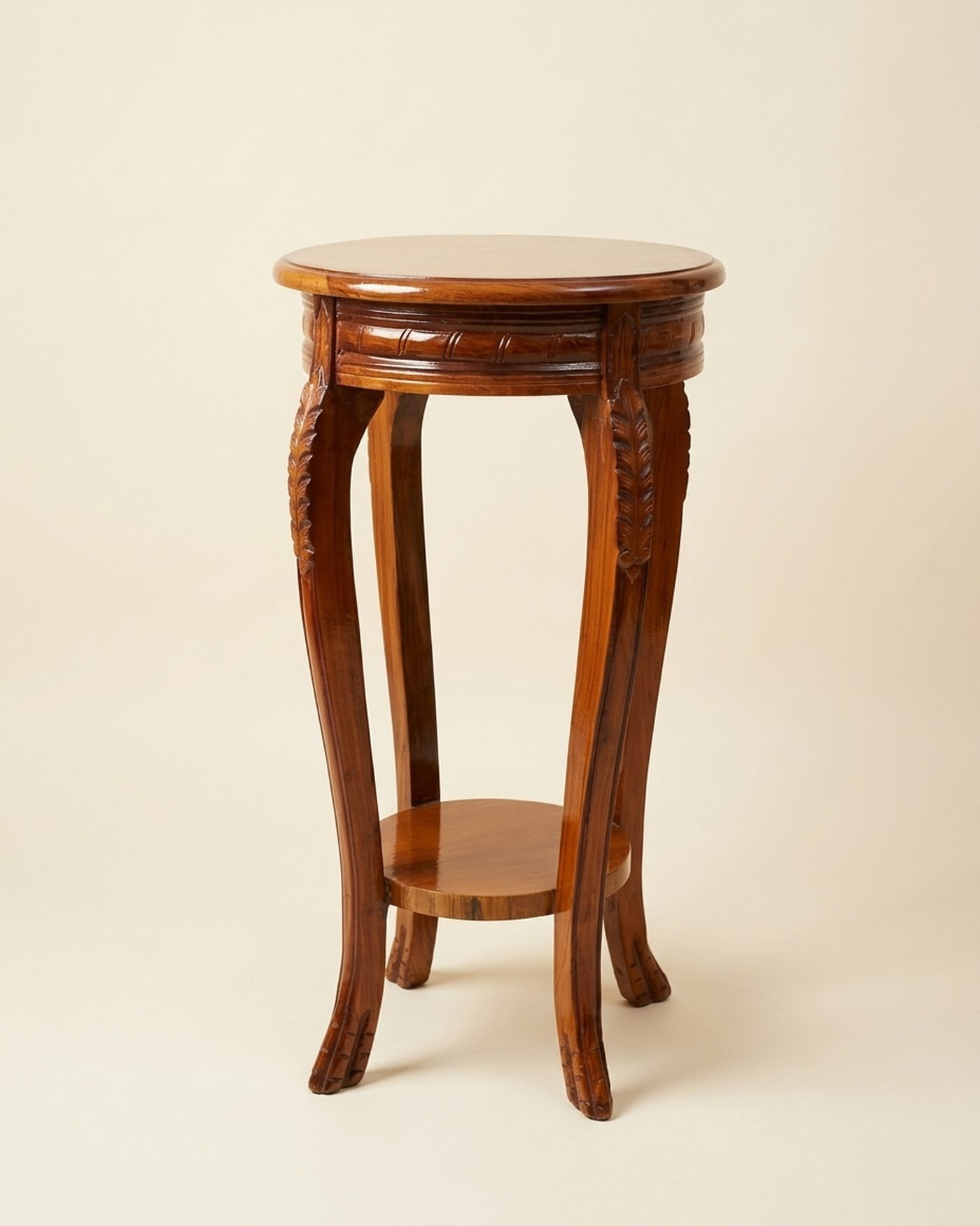 Cabriole carved plant stand, studio photo