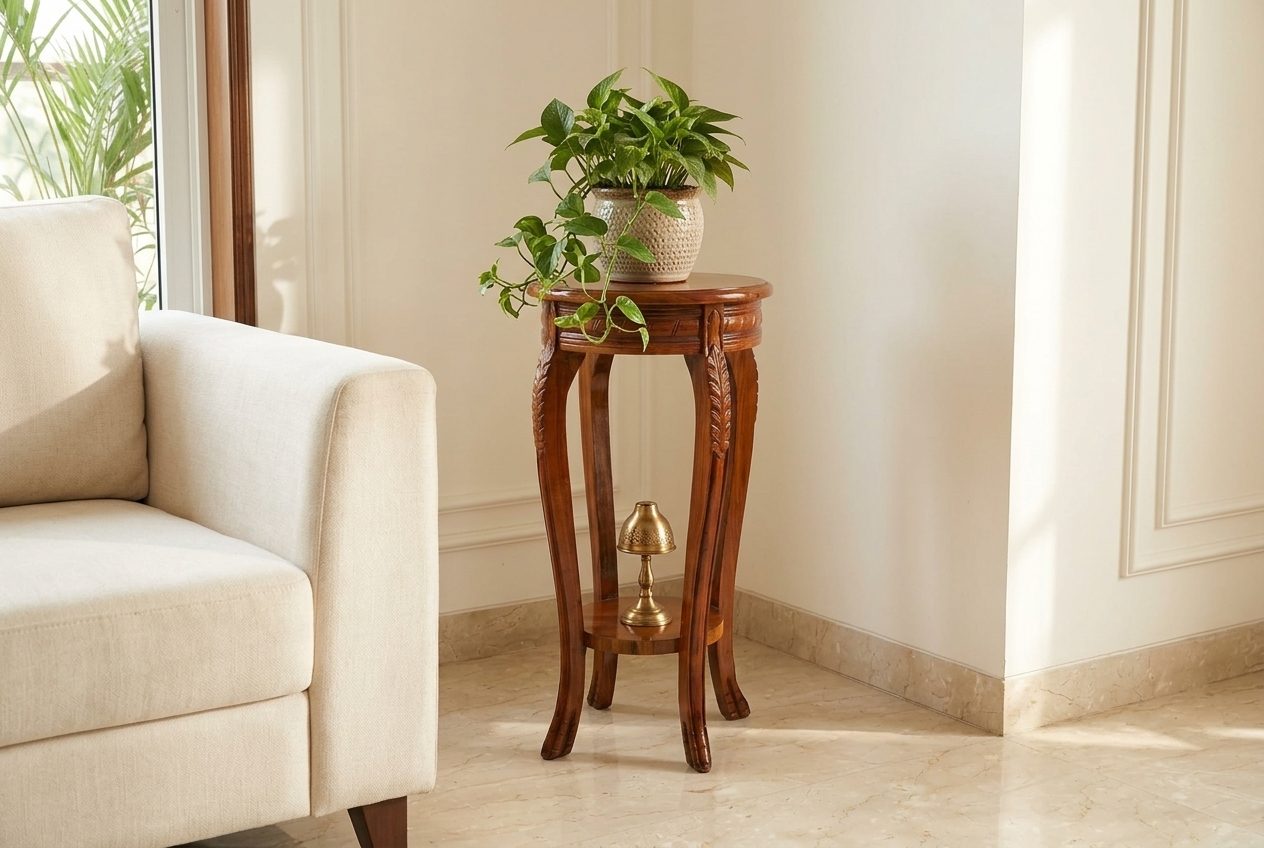 Cabriole carved plant stand in a styled room