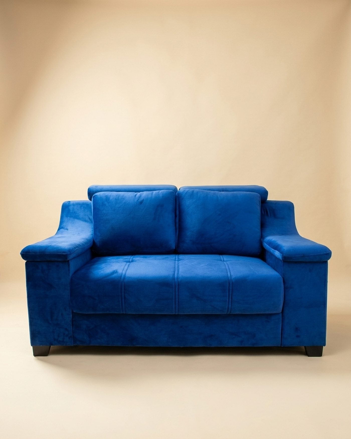 Cobalt velvet loveseat, studio photo