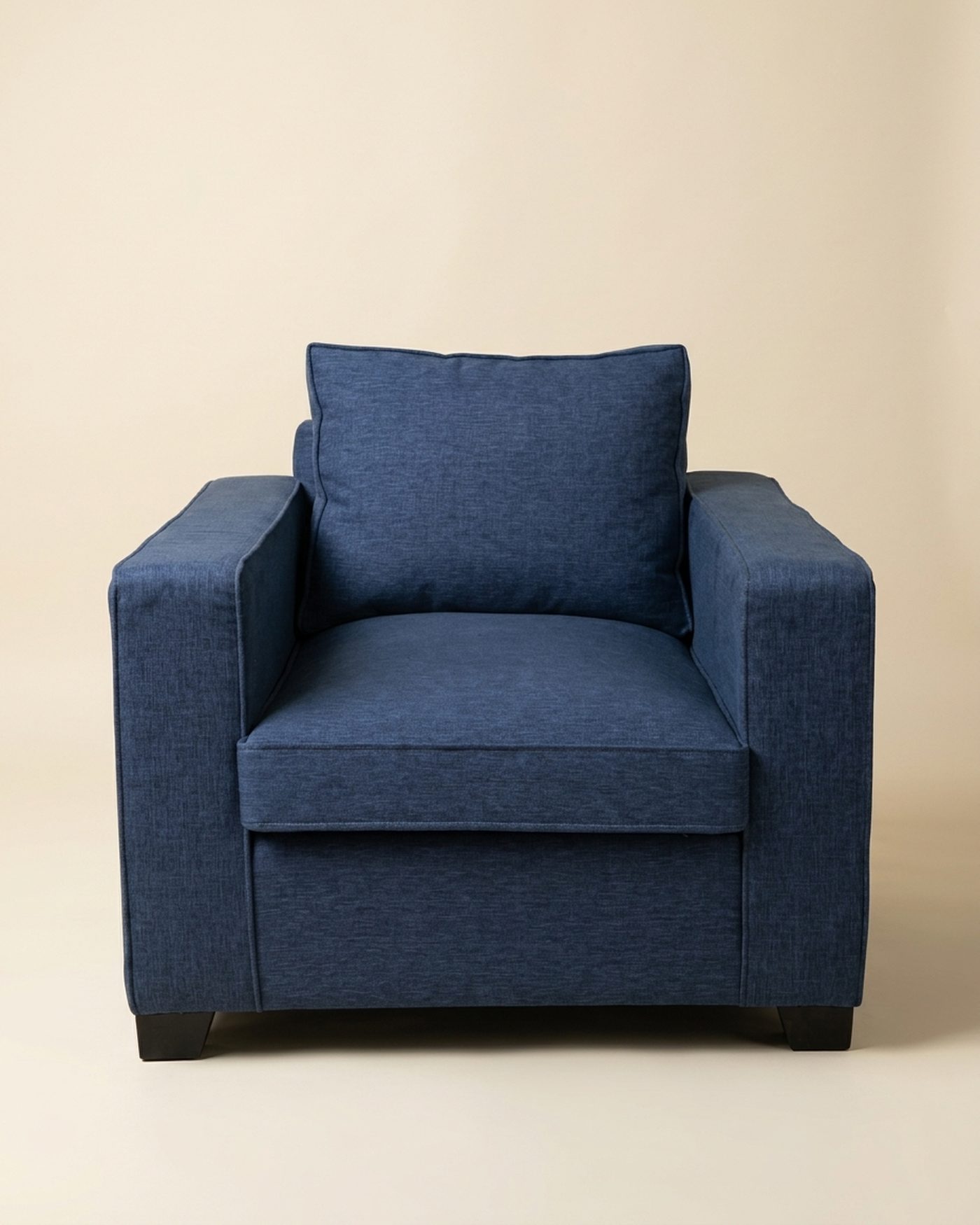 Denim armchair, studio photo