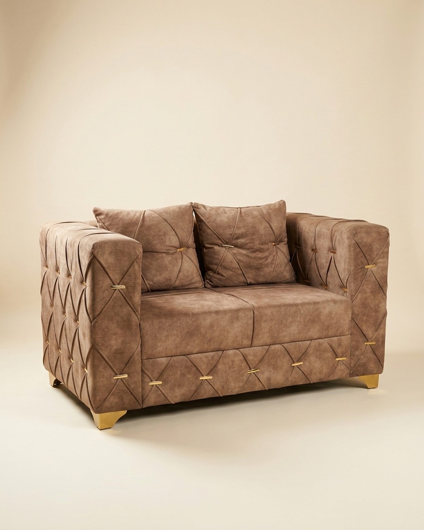 Mocha Quilt quilted loveseat, studio photo
