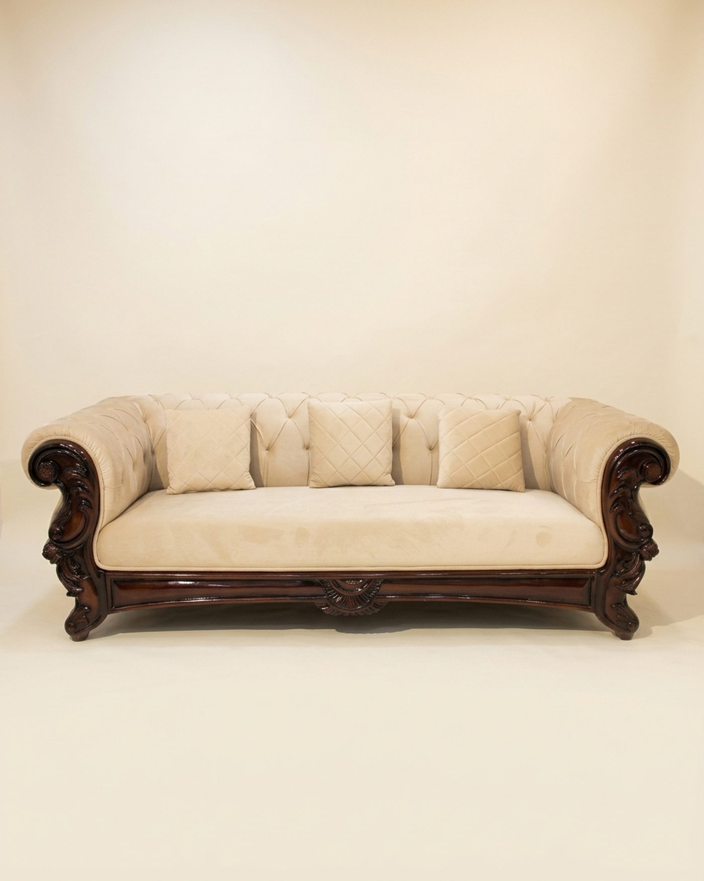 Regal carved three-seater, studio photo