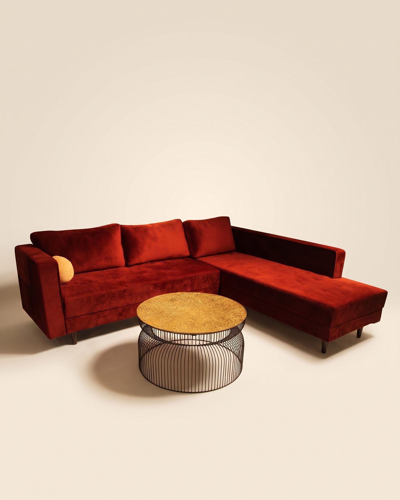 Rouge l-shaped sofa, studio photo