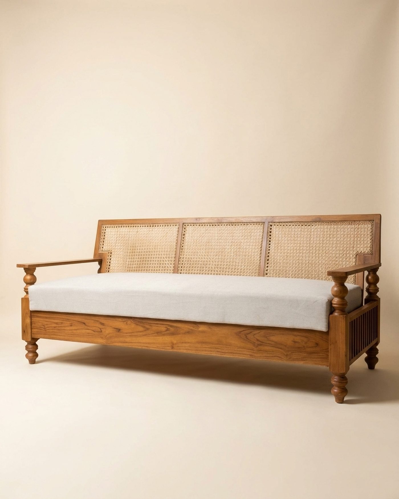 Cane cane-back day sofa, studio photo