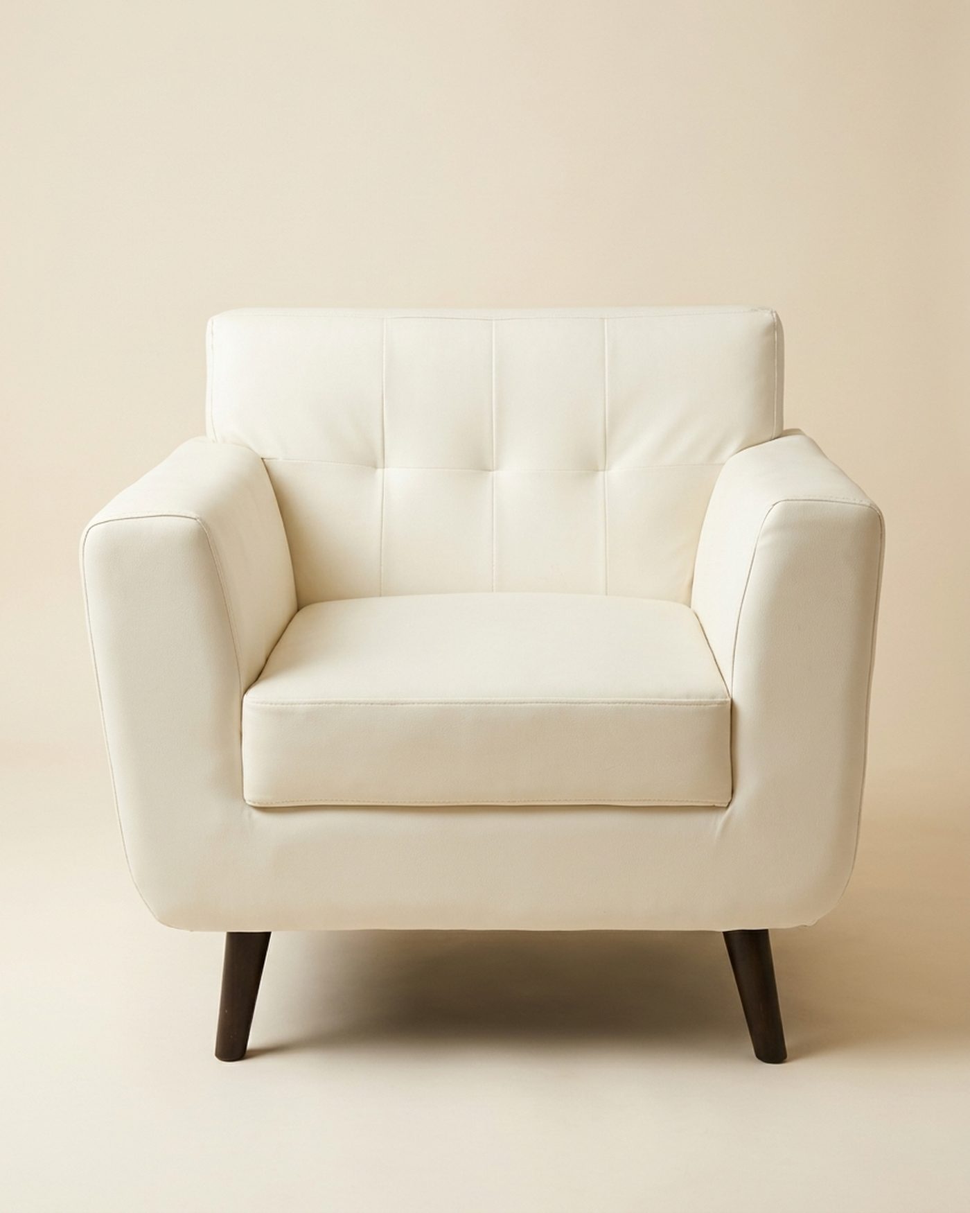 Cream armchair, studio photo