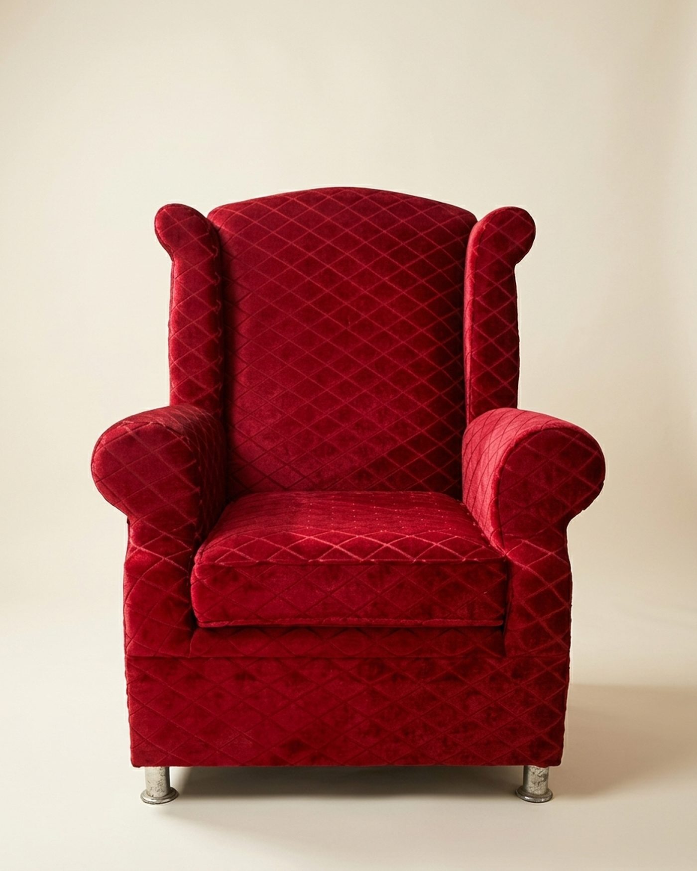 Crimson wingback chair, studio photo
