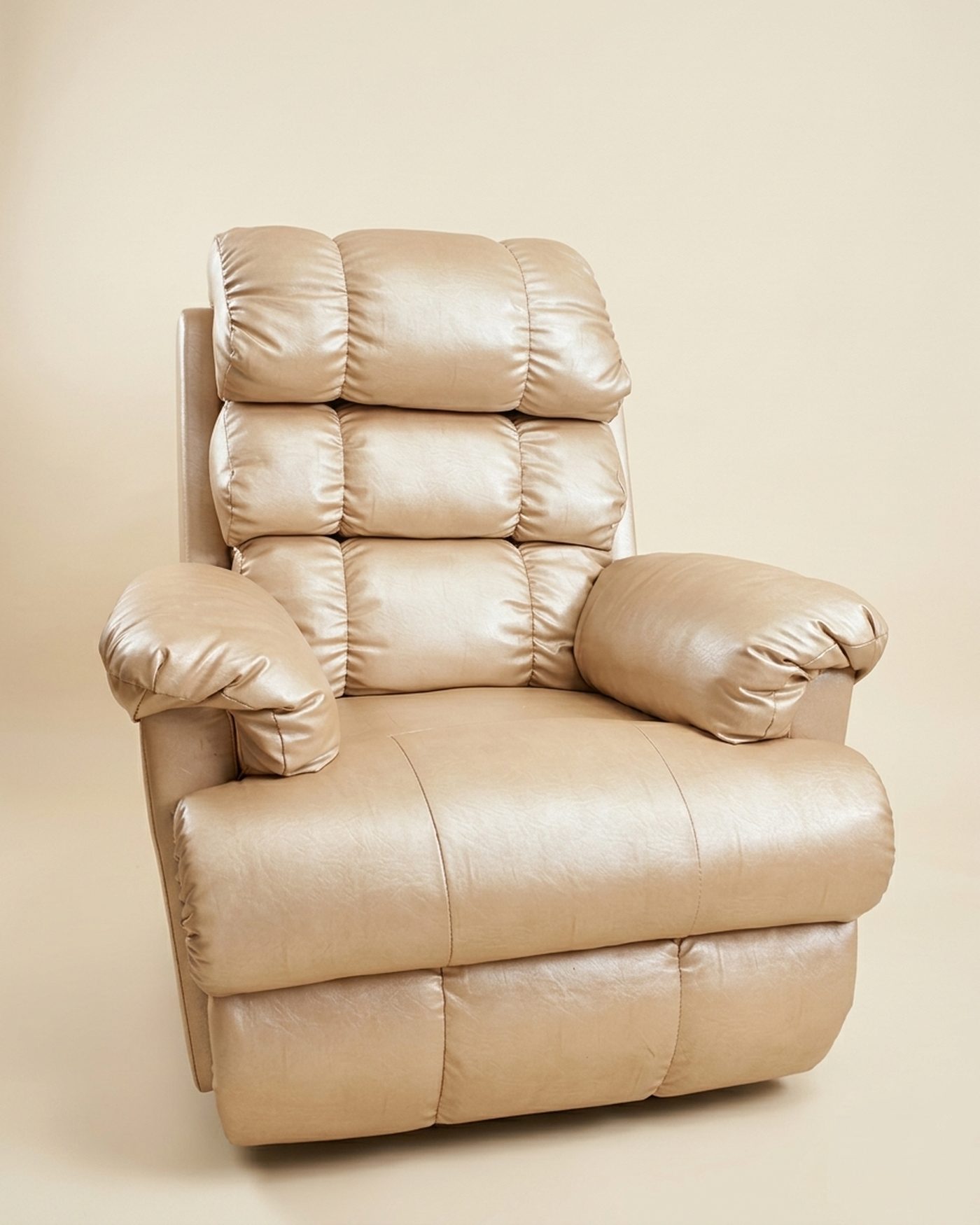 Ivory leather recliner, studio photo