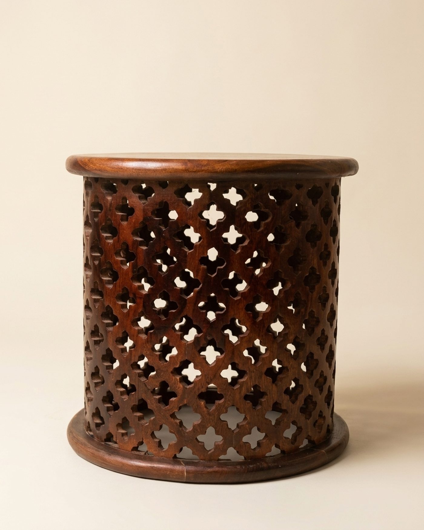 Jaali carved drum side table, studio photo