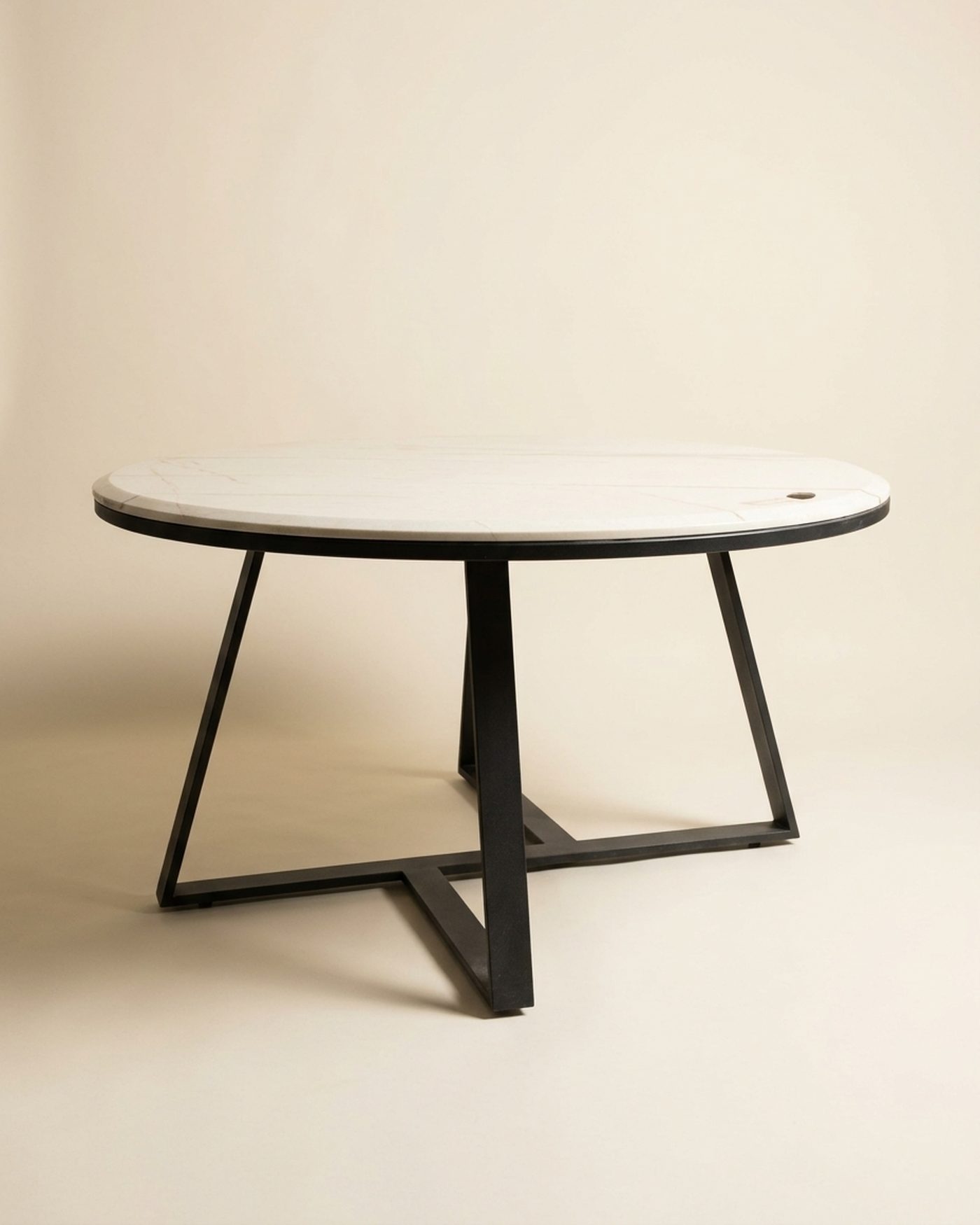 Luna round marble dining table, studio photo