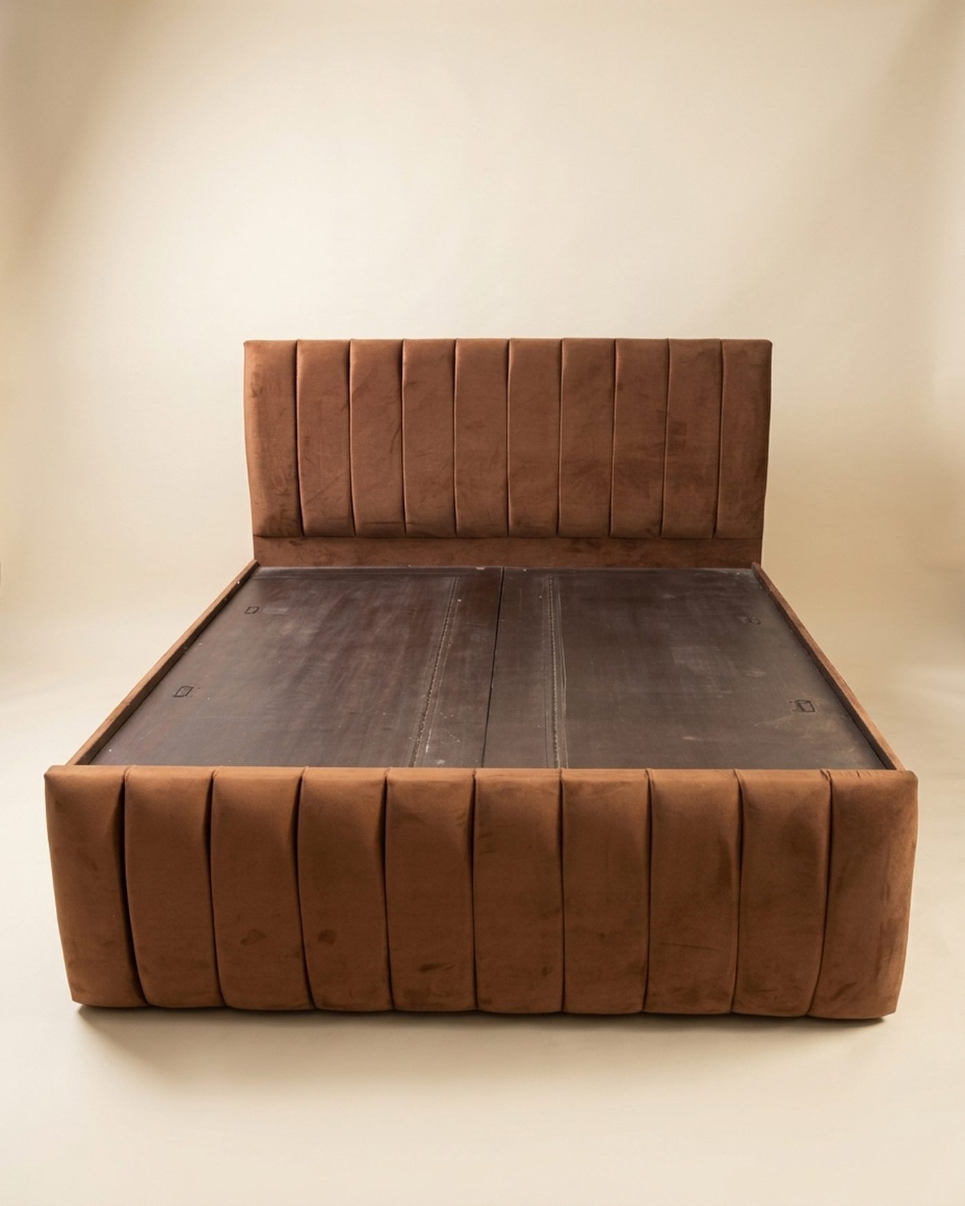 Ribbed channel-tufted bed, studio photo