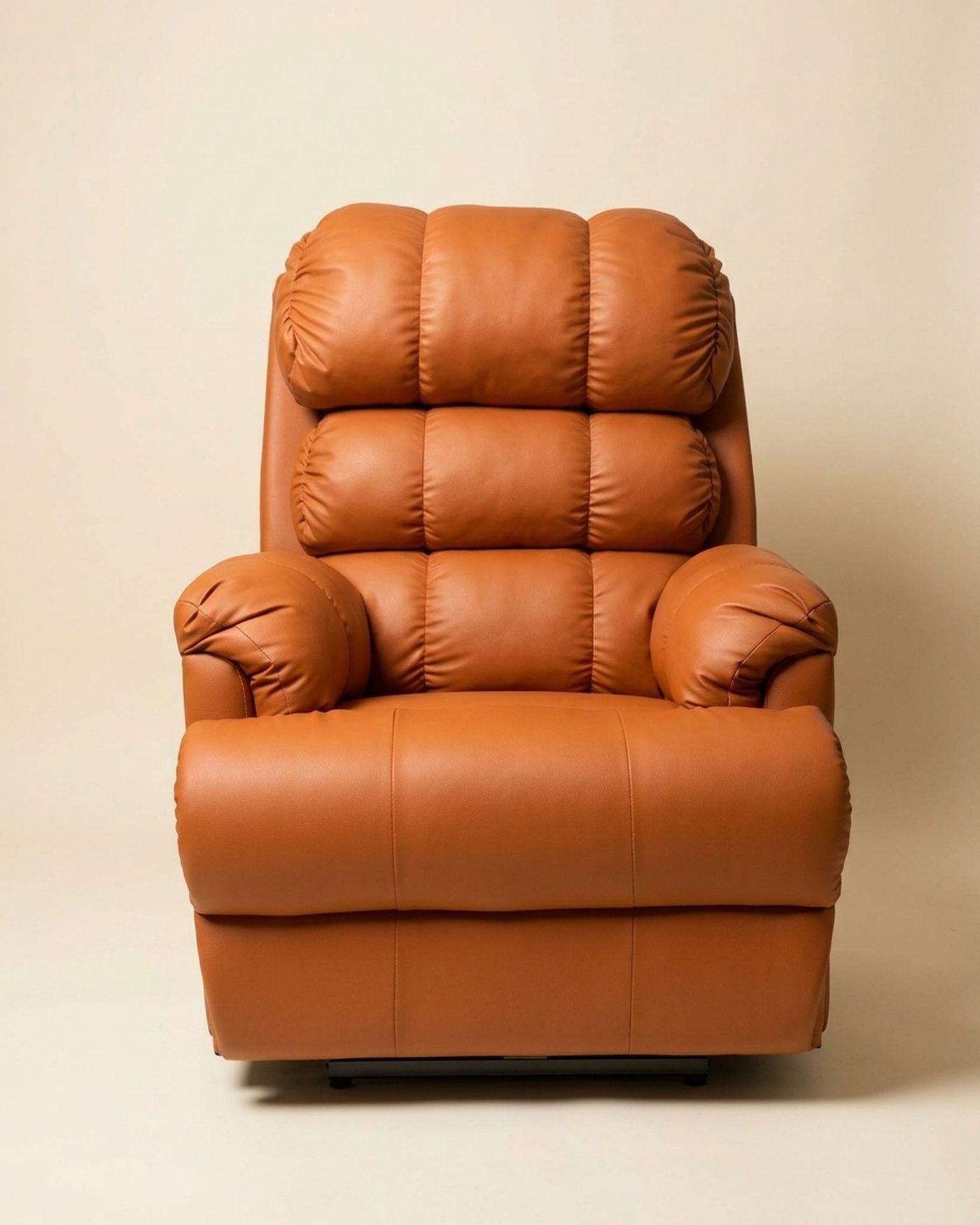 Tangerine leather recliner, studio photo