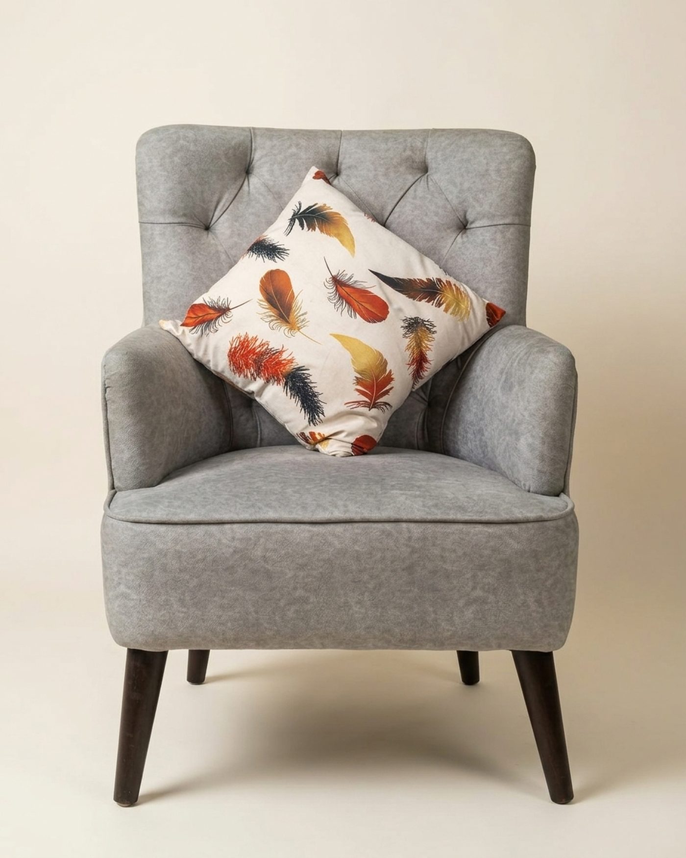 Taupe wingback chair, studio photo
