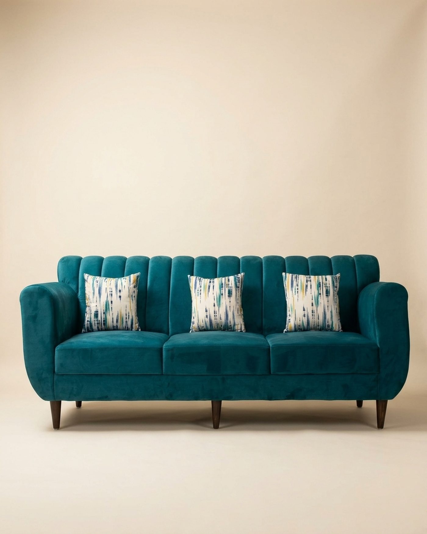 Teal channel-back sofa, studio photo