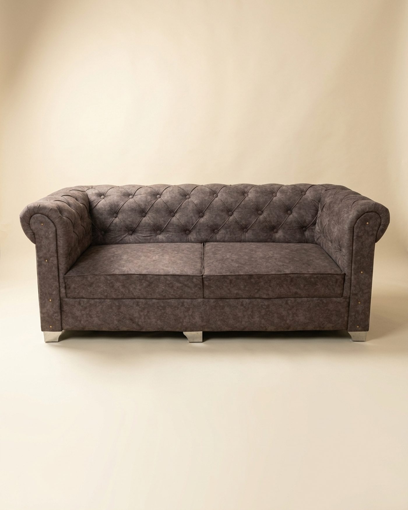 Truffle chesterfield sofa, studio photo