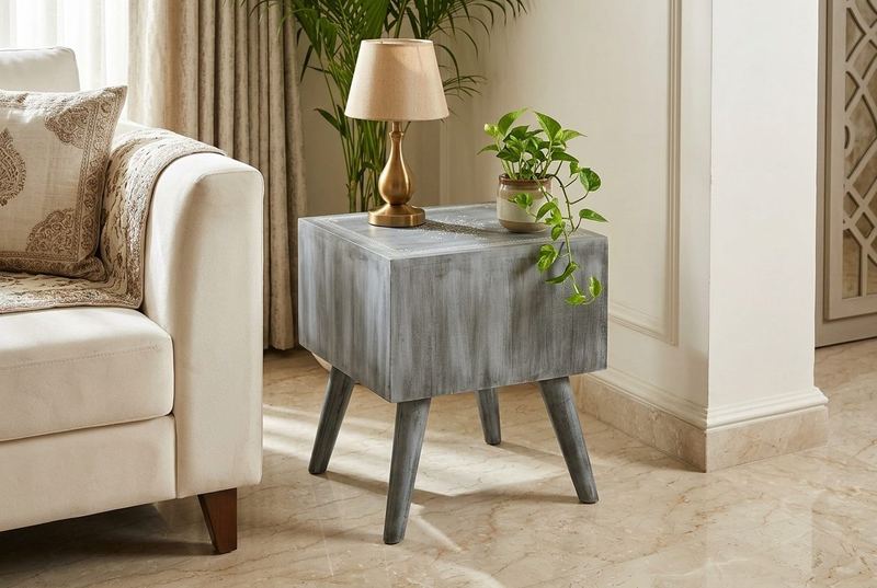 Etched painted side table in a styled room