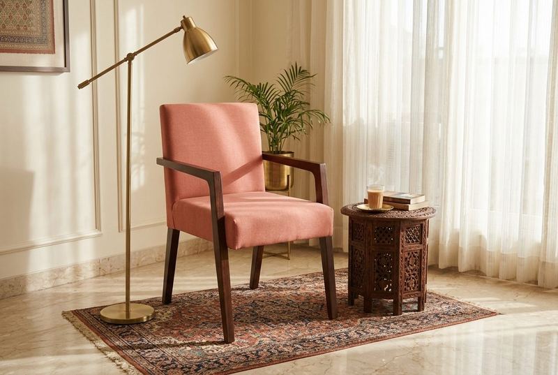Flamingo open-arm chair in a styled room
