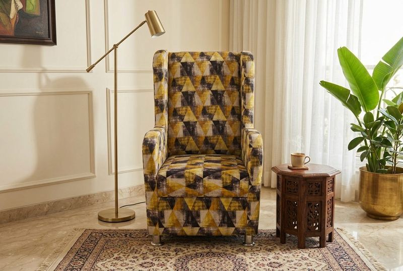Harlequin wingback chair in a styled room
