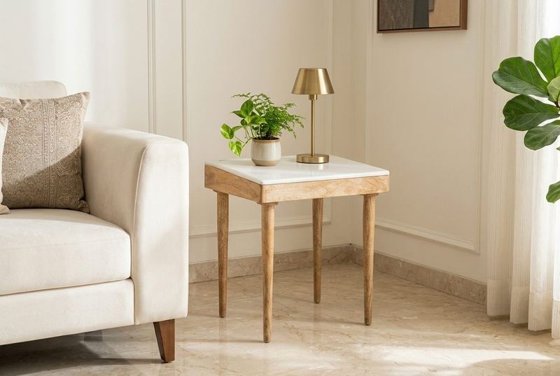 Alba marble side table in a styled room